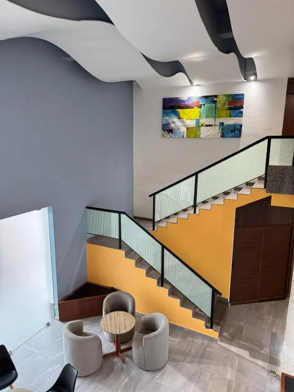 Hotel lounge beside the staircase